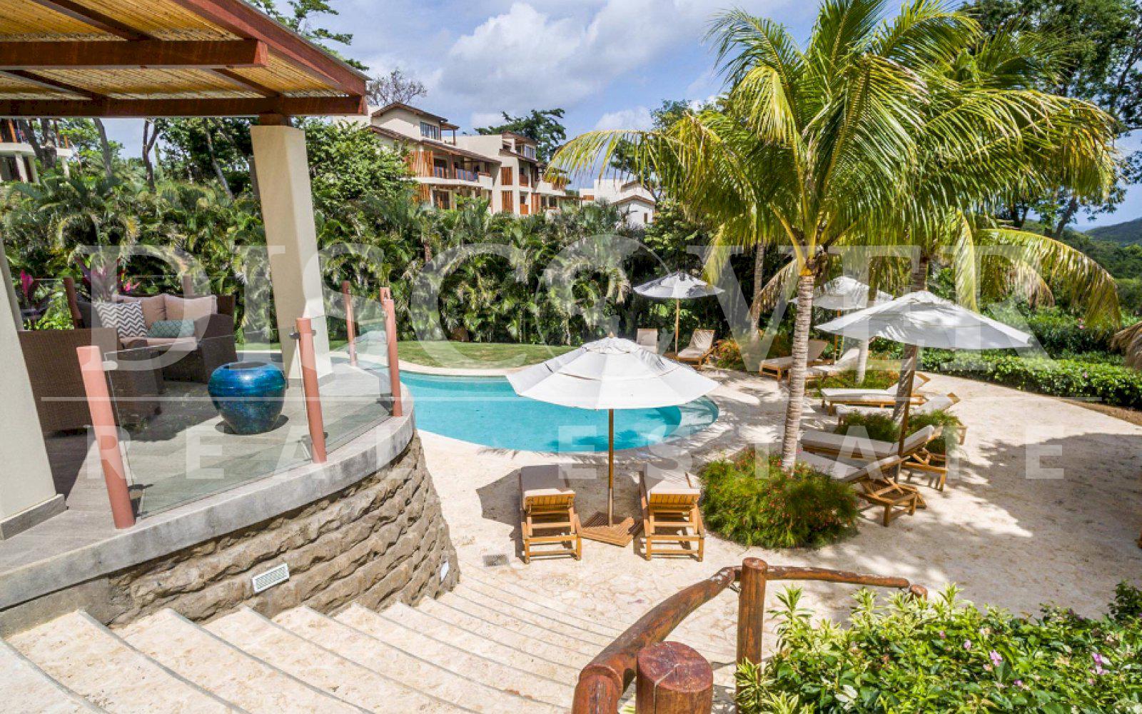 https://images.discovernica.com/propiedad/1600/TERRAZAMAINPOOL_2_1x_.jpg