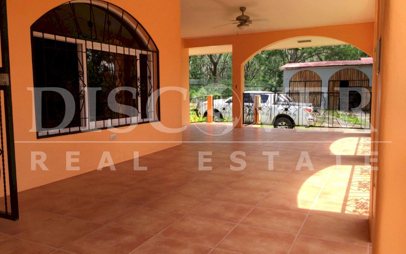 https://images.discovernica.com/propiedad/1600/front_patio.jpg